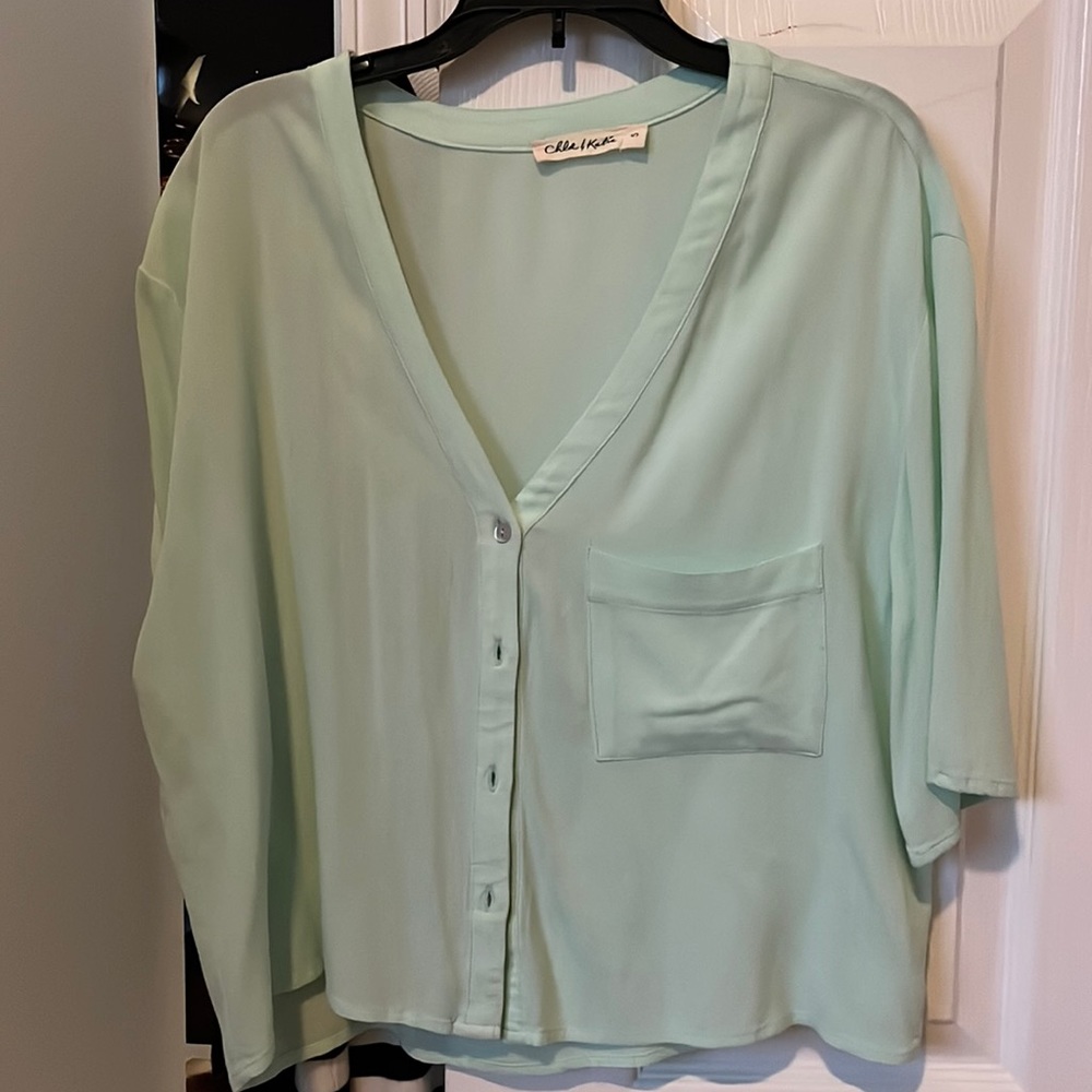light blue/green top